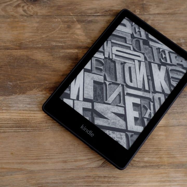 Kindle eReader on wooden tabletop