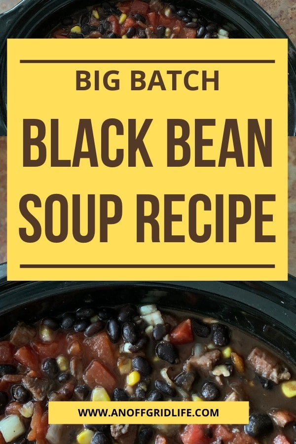 Black bean soup recipe text overlay on soup in black bowl with chunky tomatoes, corn and black beans