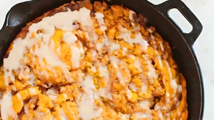 A pumpkin cinnamon roll skillet cake.