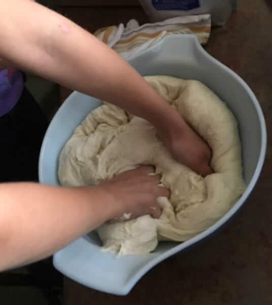 kids kneading bread