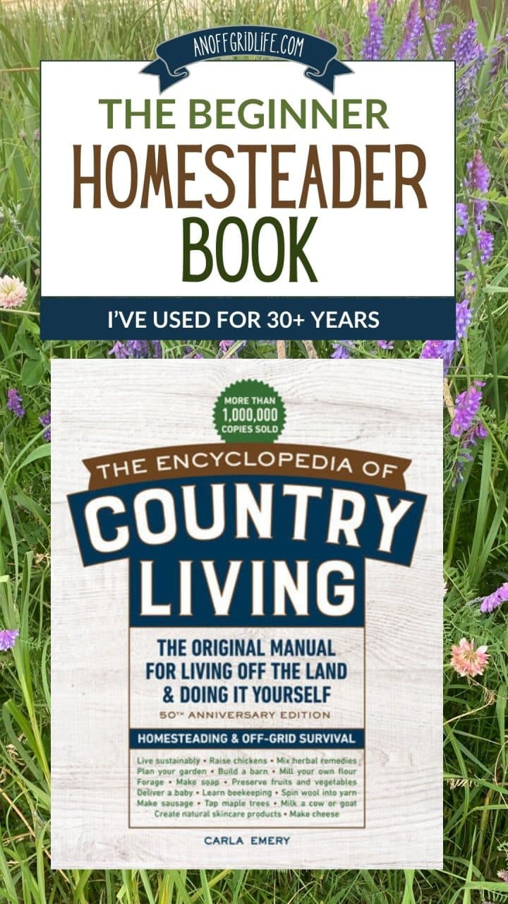The cover of "The Encyclopedia of Country Living" book is displayed against a background of purple flowers and green grass.