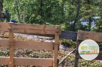 Upright wooden skids on an off grid homestead