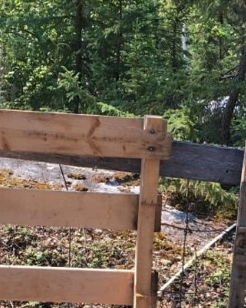 Upright wooden skids on an off grid homestead