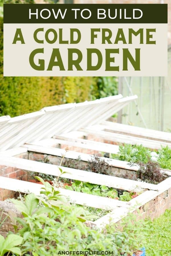 a pinterest image of a white cold frame garden with a brick bottom and text overlay "how to build a cold frame garden"