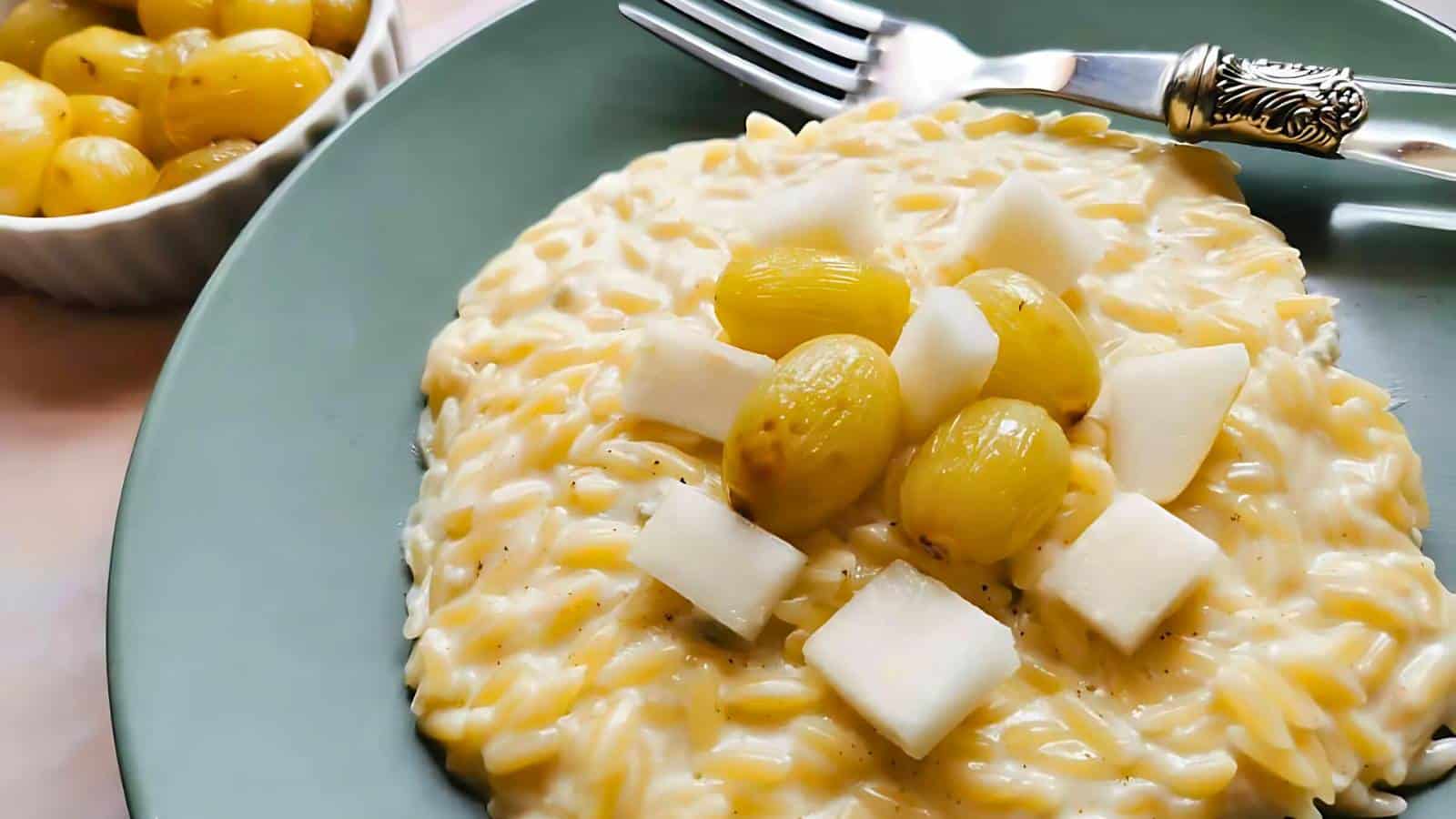 A pot of hearty stew with chunks of vegetables, meat, and peas in a thick broth, being stirred with a black ladle.