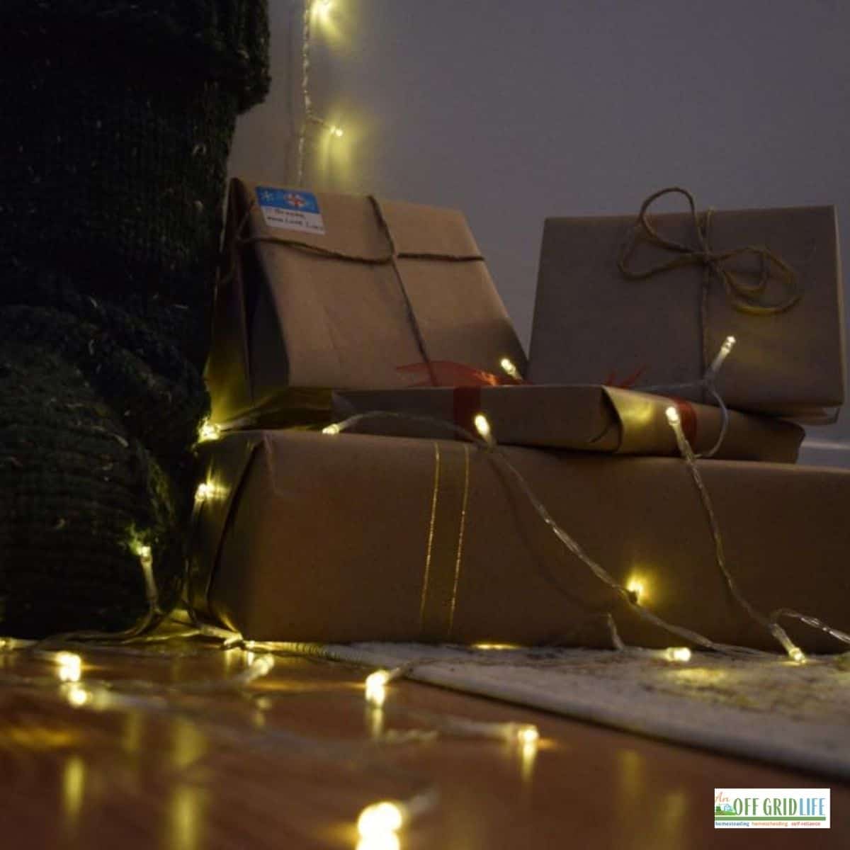 several small christmas gifts wrapped in brow recycling paper
