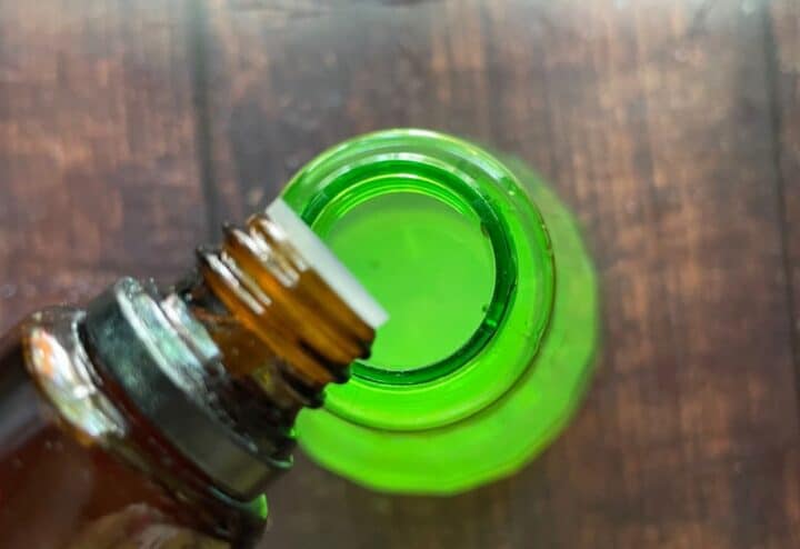 Adding essential oils to bug spray.