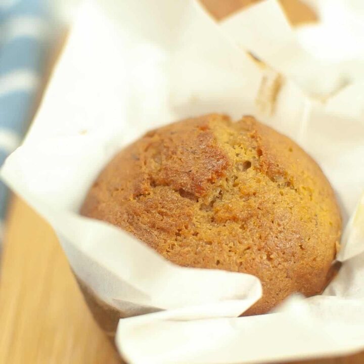Sourdough discard banana muffin in parchment paper.