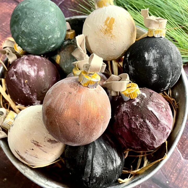 Christmas vintage ornaments in a metal bowl.