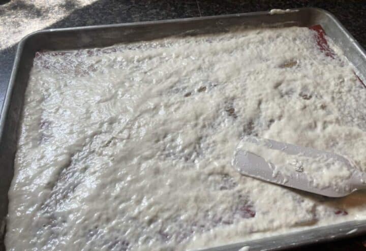 Dehydrating sourdough starter on a cookie sheet.