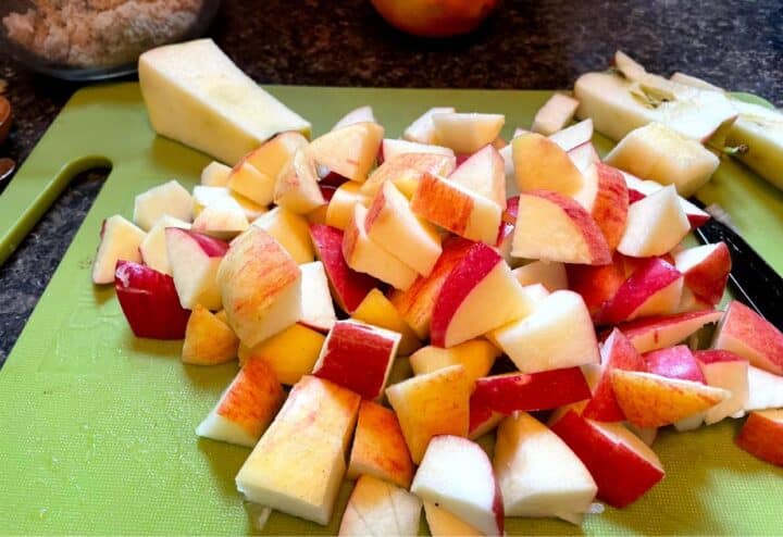 Sliced apples on a cutting board.
