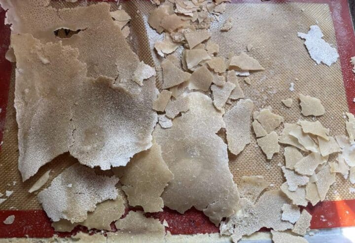 Dried sourdough starter ready to break into pieces.