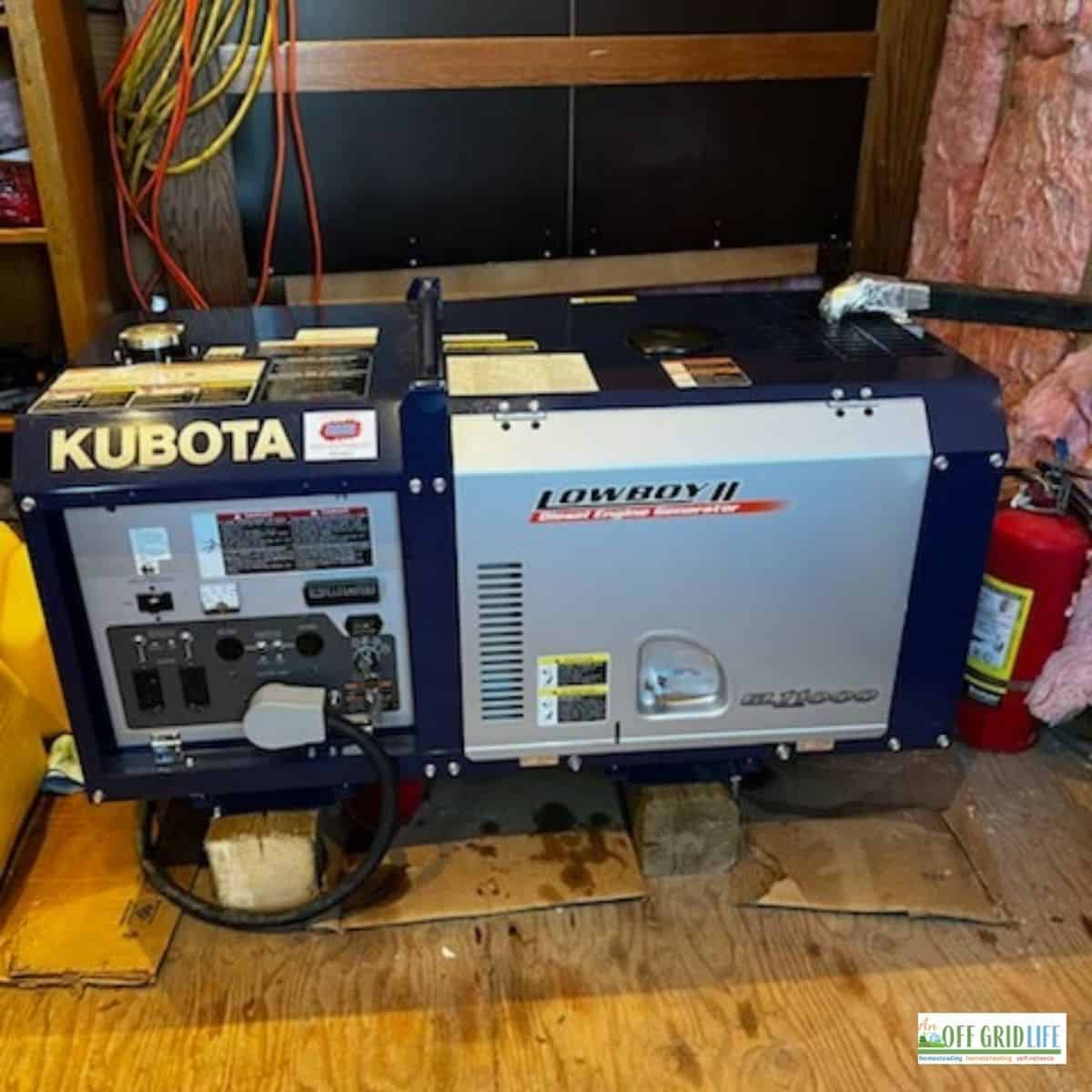 a picture of a blue Kubota generator in a generator shed