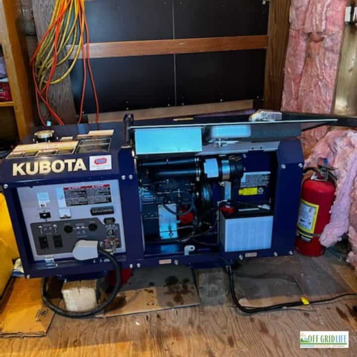 a picture of a blue kubota generator in a generator shed