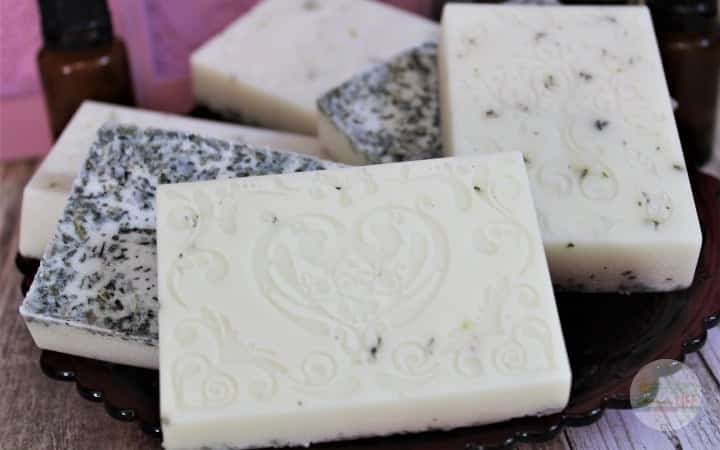 Goat milk soaps for sinus relief - homemade bar soaps with essential oils in background