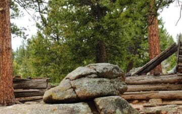 Large boulder near homestead pioneer fence