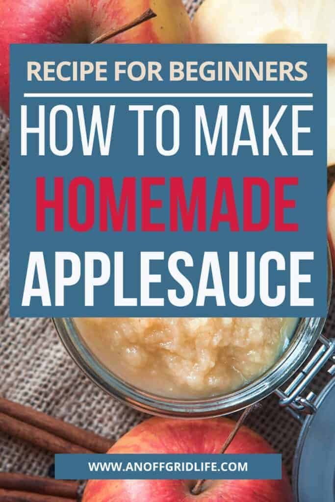 How to Make Homemade Applesauce text overlay on applesauce in mason jar on a wooden tabletop with cinnamon sticks