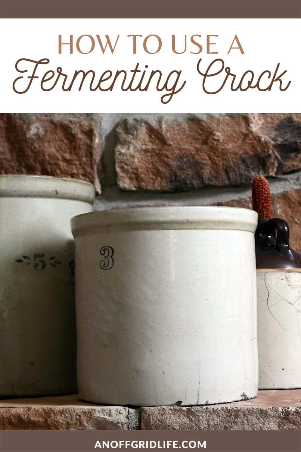 a pinterest image of three white stone crocks on a brick shelf, text overlay "how to use a fermenting crock"