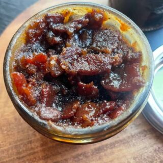 Maple bacon bourbon jam in jar.