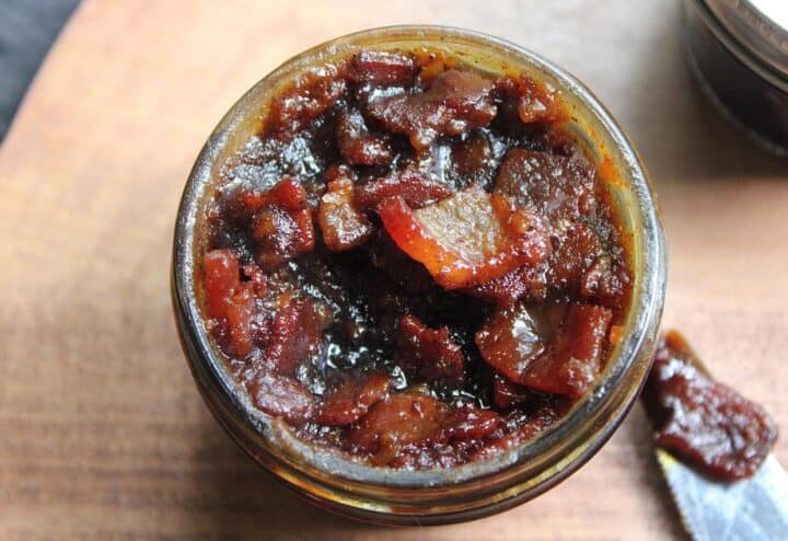 Maple Bacon Bourbon Jam with knife.
