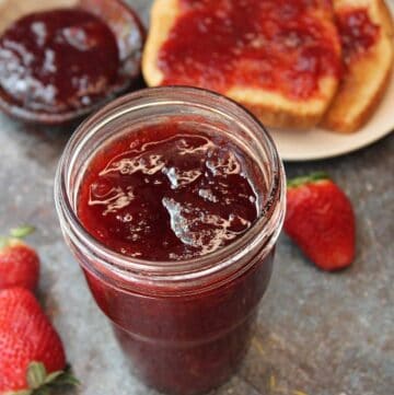 Mason jar of homemade strawberry jam.