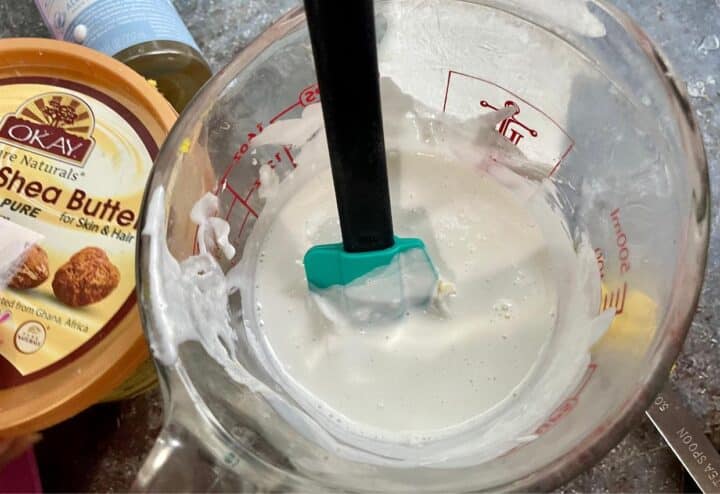 Homemade shampoo bar mixture in a mixing bowl.