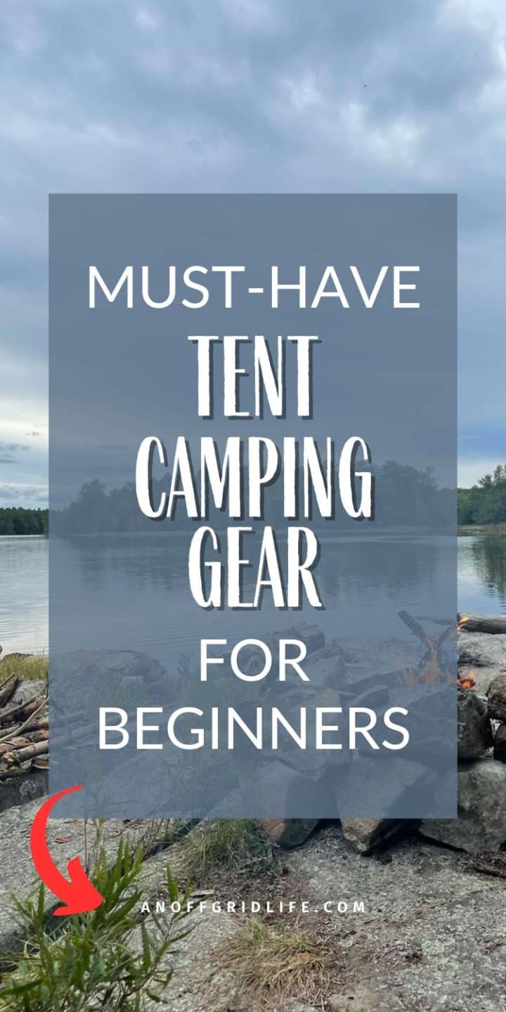 A lake with a cloudy sky is in the background. In front is text: "Must-Have Tent Camping Gear for Beginners" with a website URL at the bottom: ANOFFGRIDLIFE.COM.