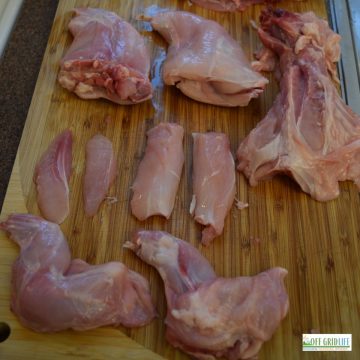 a rabbit that is disassembled into each piece, in preparation for cooking