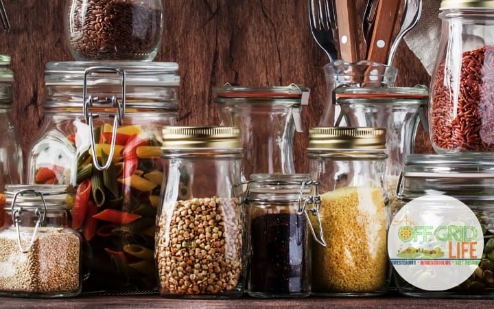 A variety of food-filled glass jars for a pantry cleaning checklist.