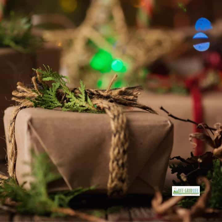box wrapped in brown paper and rope with cedar sprigs