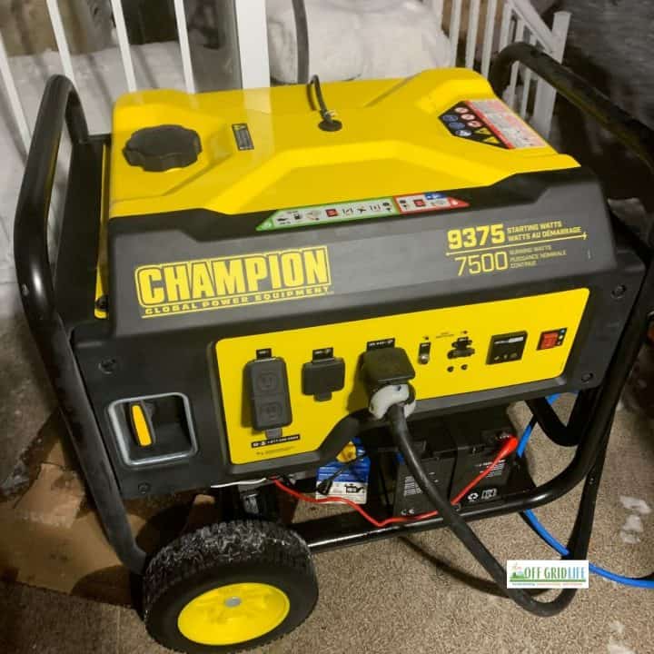 Champion portable gasoline generator on the front porch of our off grid home