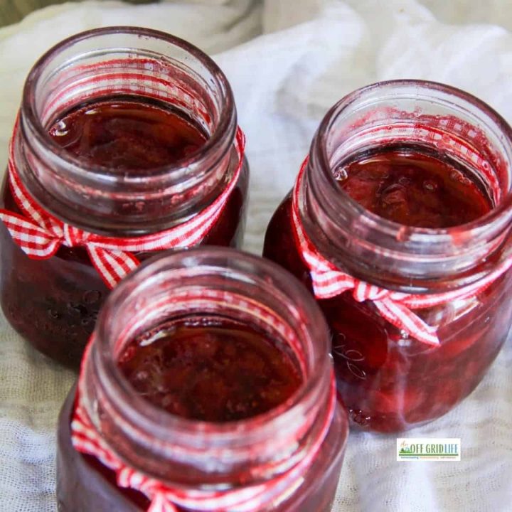 Strawberry Syrup in jars with ribbons