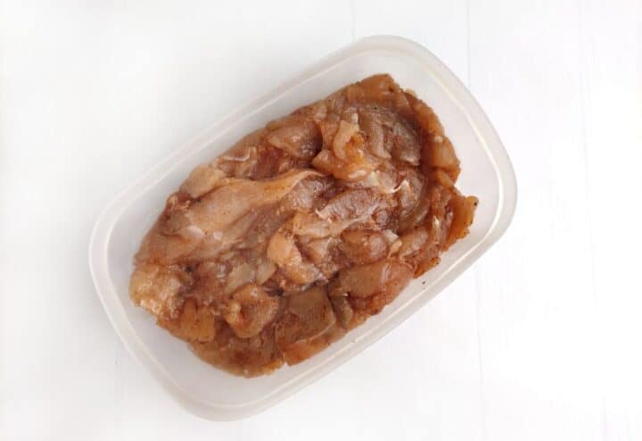 Prepping chicken for jerky.