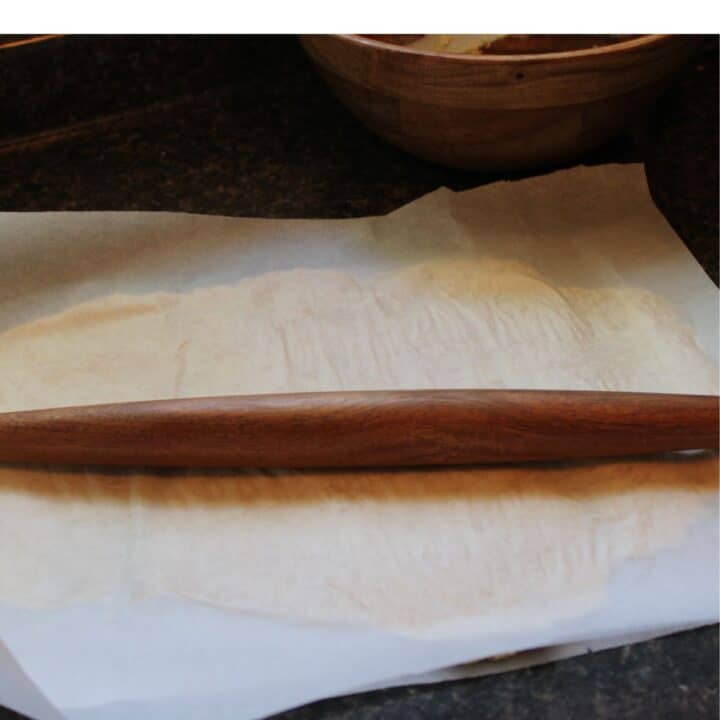 Rolling sourdough discard dough.