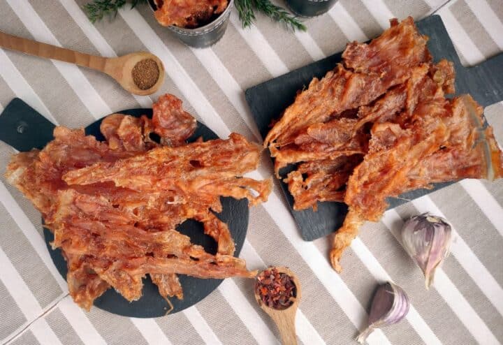 Serving chicken jerky.