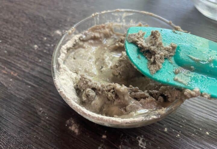 Smoothing toothpaste in bowl