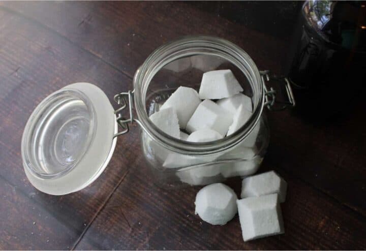 Store DIY homemade toilet cleaner bombs in a glass jar