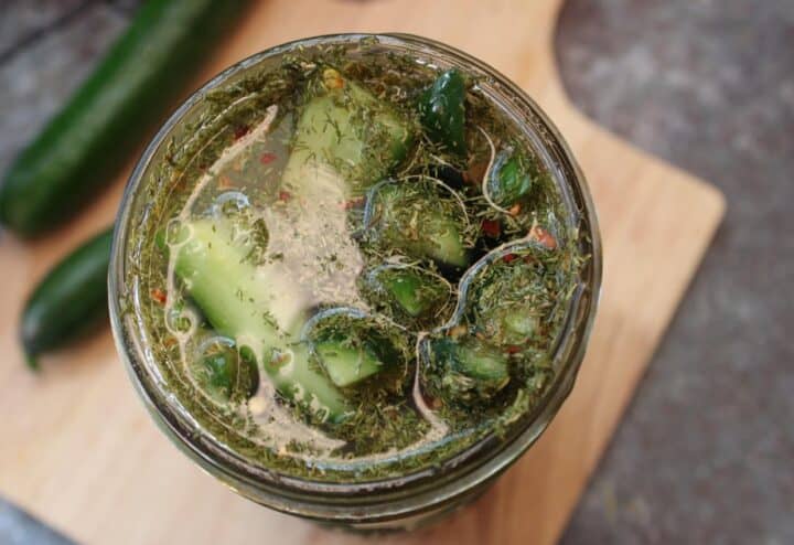 Top view of homemade garlic dill pickles.