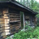 Log cabin off the grid.