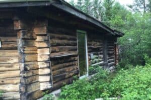 Log cabin off the grid.