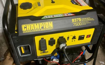 Generator for home use sitting outdoors.