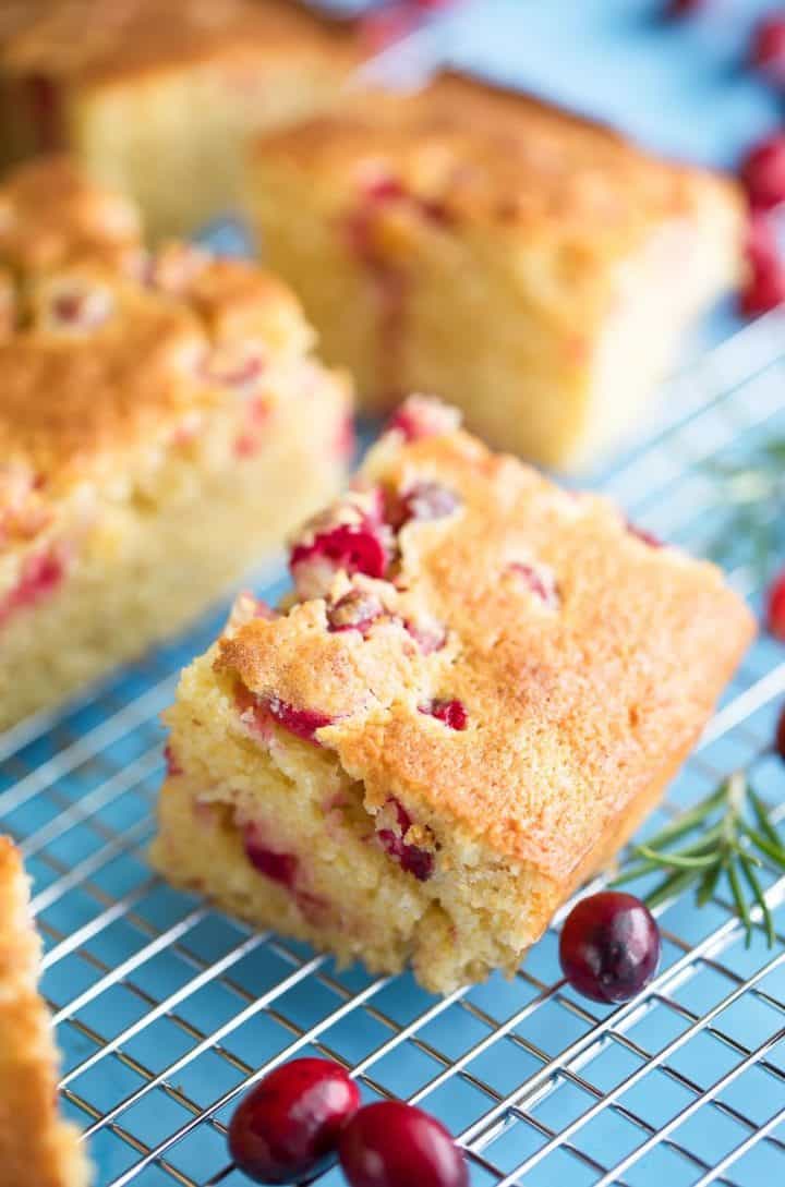 cranberry cornbread squares on wire rack