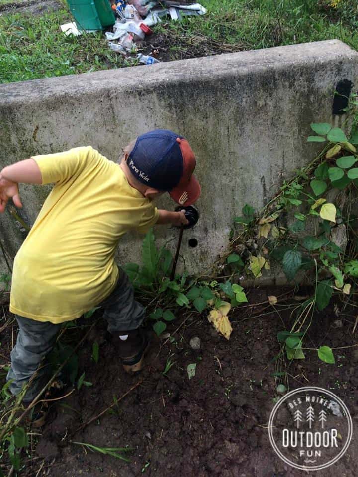 small boy geocaching