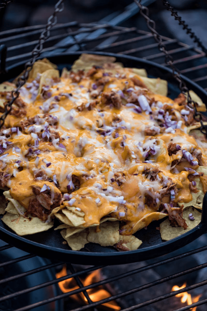 loaded chicken nachos over the campfire