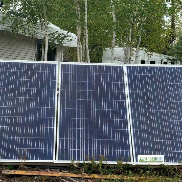 Solar panels on a frame at ground level generating Off grid electricity
