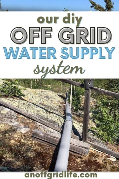 Our diy off grid water supply system above ground pipe going over rock down to the lake