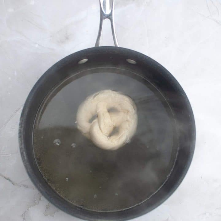 Dough boiling in a pot of water.