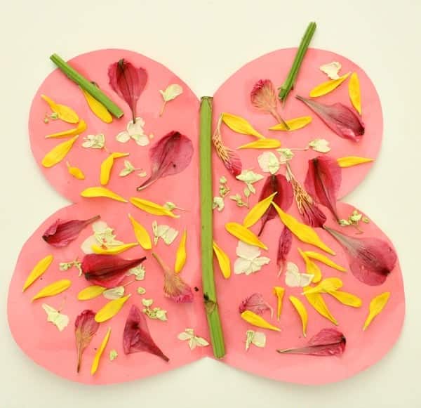 butterfly craft with paper and flower pieces