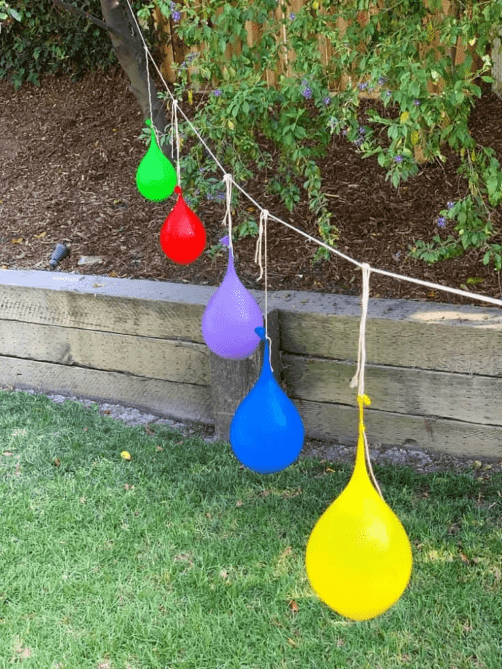 water balloon pinatas on a line